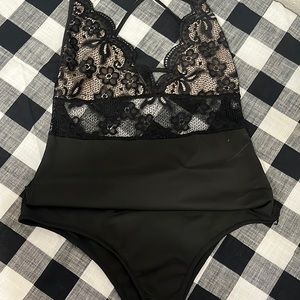 New , never use Sexy Black bodysuit size L